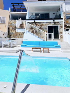Exclusive villa with heated saltwater pool, roof terrace with beautiful views in Mogán